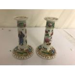 A pair of Oriental candlesticks