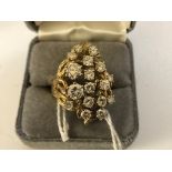 A 14k abstract diamond set ring: total carat weight approx 2ct