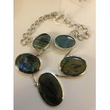 A silver and labradorite large oval necklace