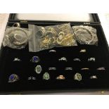 A case of costume jewellery to inc rings,