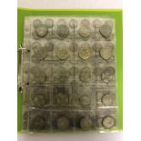 A green folder of coins: 83 pre-47 silver coins and 72 copper coins: George III to VRI (155)