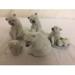 Four Lladro polar bears together with a Noa bear