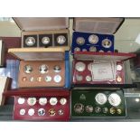 Six cased silver proof coin sets of The Commonwealth