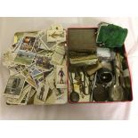 A box of odds to inc a Lusitania medal, jewellery, cigarette cards,