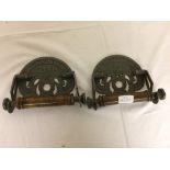 A pair metal of toilet roll holders