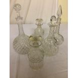 Five glass decanters