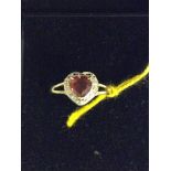 A 9ct gold heart-shaped ring