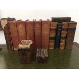 A quantity of books to inc leather-bound literary examples and faux book volumes with hidden