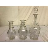 Three glass decanters