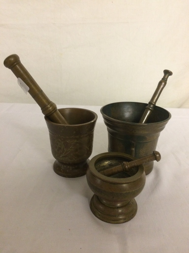 Three bronze pestle and mortars