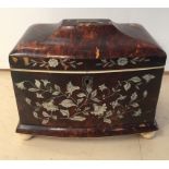 A 19th century tortoiseshell tea caddy with mother-of-pearl floral inlay