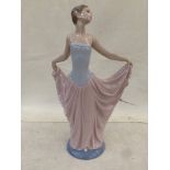 A Lladro figure of a dancer,