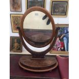 A Victorian mahogany swing mirror