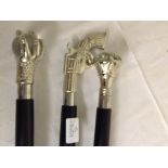 Three silver-plated topped walking sticks