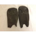 A pair of bronze pin trays in the form of owls