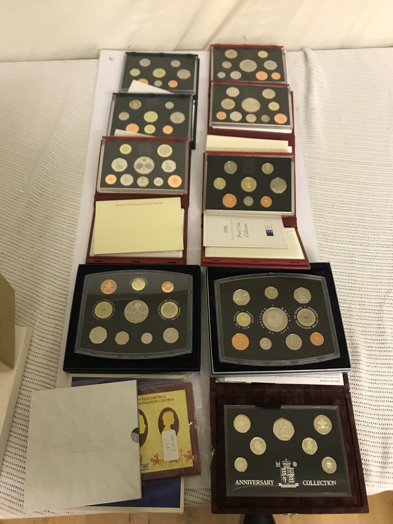 Nine Proof coin sets and BUNC sets