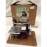 A boxed Essex miniature sewing machine