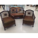 A 1920S mahogany-framed Bergere suite