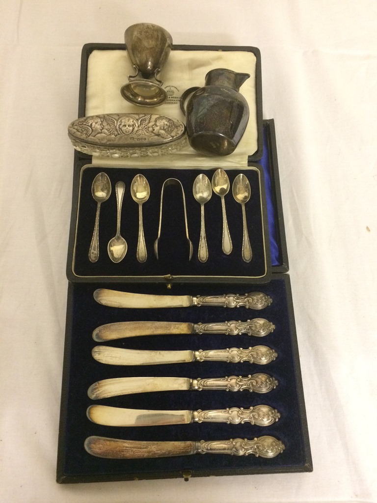 A quantity of HM silver to inc cased teaspoons, knives,