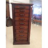 A 19th century mahogany 9 drawer wellington chest with shell handles, 1 darwer stamped maker J.