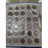 A blue folder of coins,