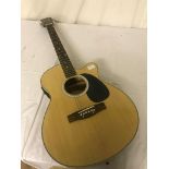 An electric acoustic guitar by Swift