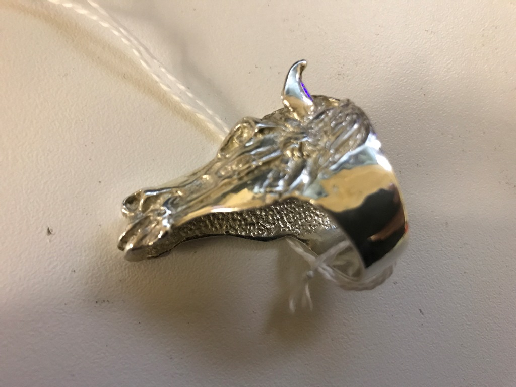 A silver horsehead ring