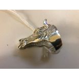 A silver horsehead ring