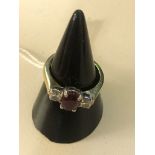 An 18ct diamond and ruby dress ring