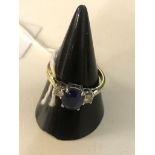 An 18ct diamond and sapphire dress ring