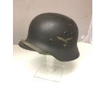 WWII German Q64 Luftwaffe tin hat with Single Decal and liner and strap.