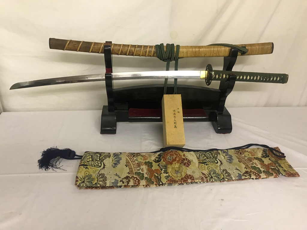 Early 20th C Hand made Katana, with Sukachi Tsuba, and Stand, oil/Sharpening kit and silk sword bag.