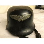 A WWII German Luftschutz tin helmet and liner