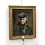 An oil on board depicting a portrait of the Red Baron, signed lower right & dated 1942,