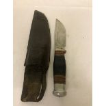 Circa 1930s Wade and Butcher "Boone" Bowie knife and Sheath.