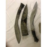 Silver Presentation Khukri with high relief Gurkha to the front beneath crossed Khukri`s above a