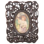 A 19th Century Oriental Hardwood Photograph Frame: With Lobed shape to the outside and filigree