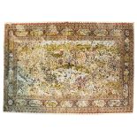 A silk rug with cream fringing: Depicting the garden of paradise/Eden with a proliferation of