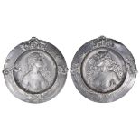 A Pair of WMF Wall Chargers: Embossed with female heads with long flowing hair and floral borders,