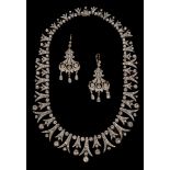 A Late 19th Century Diamond Fringe Necklace and Pair of Diamond Earrings: The collet-set old