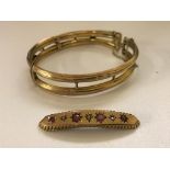 A vintage gold bangle with ruby and diamond (A/F)