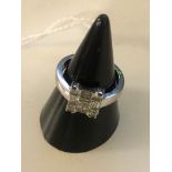 An 18ct Deco-style diamond ring with baguette,