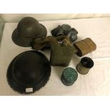 WITHDRAWN A WWII Brodie helmet; together with fire watchers, two gas masks,