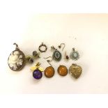 A quantity of vintage pendants,