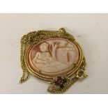 A 9ct cameo and garnet set pendant on chain