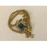 An emerald pendant