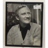 A Leslie Phillips signed photograph in frame