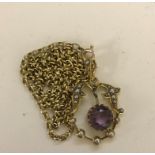 An 18ct Edwardian amethyst and pearl pendant on chain