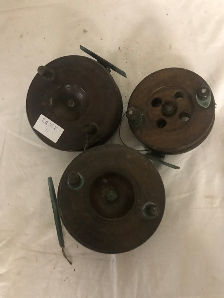 Three antique fishing reels