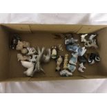 A box of Wade figures etc